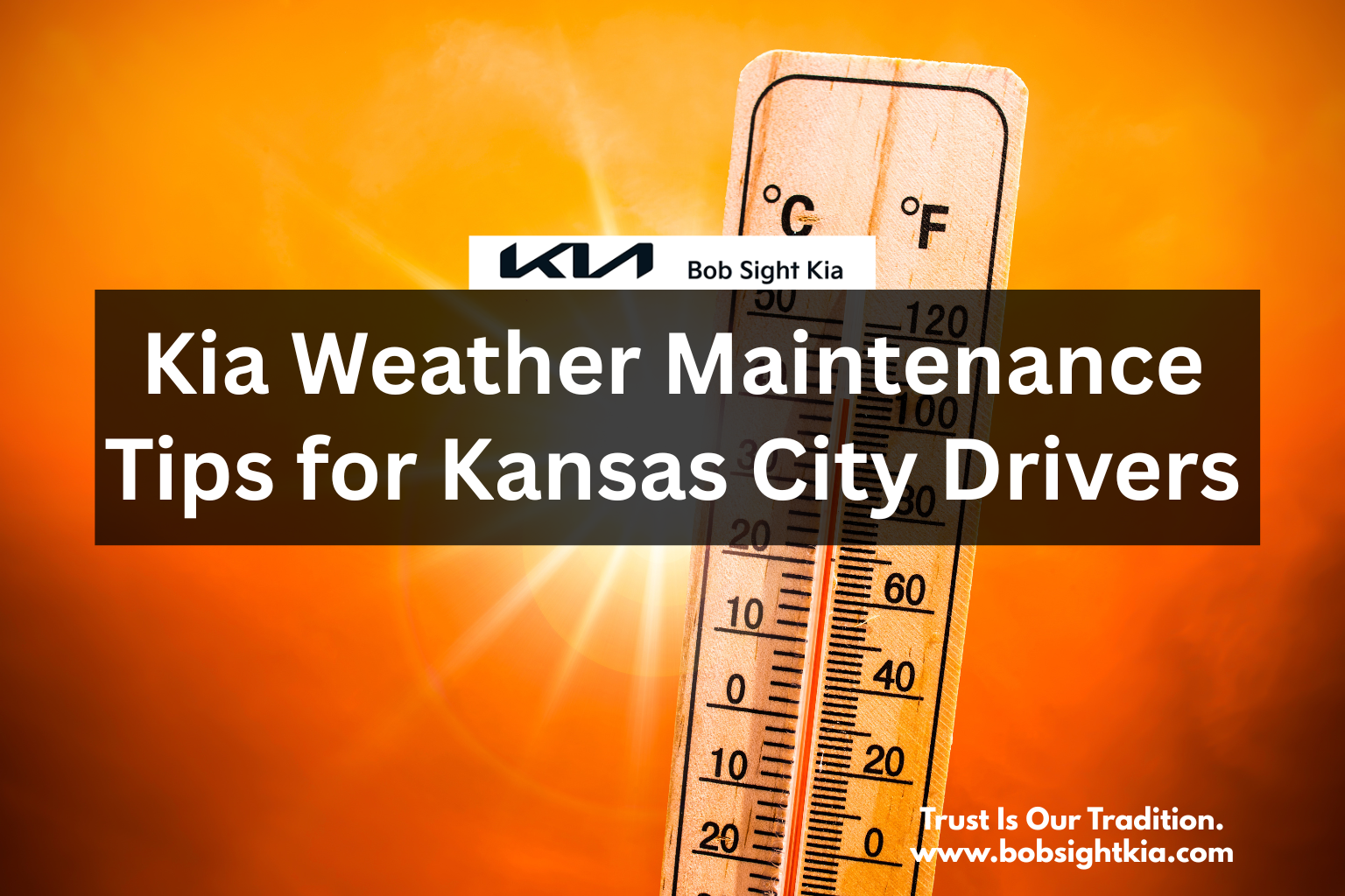 A certified Kia technician performing seasonal maintenance at Bob Sight Kia in Independence MO for a Kansas City-area driver.