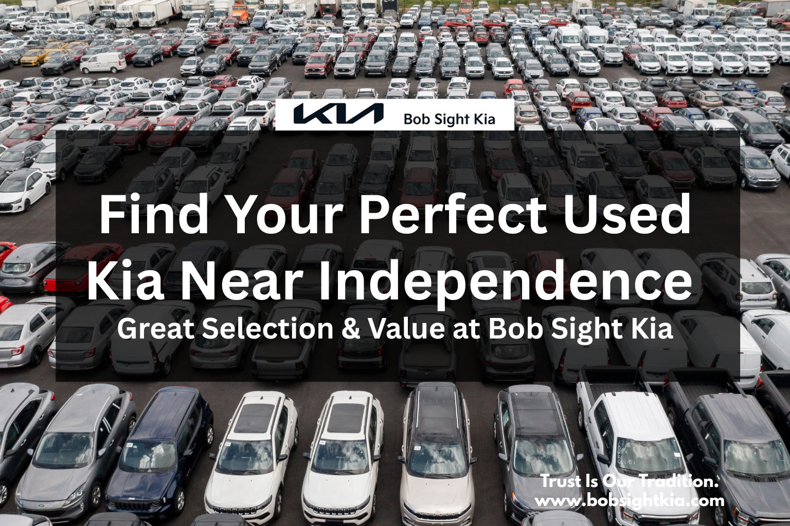 Bob Sight Kia used car lot in Independence MO with Kia Sorento, Soul, and Sportage models available for sale.