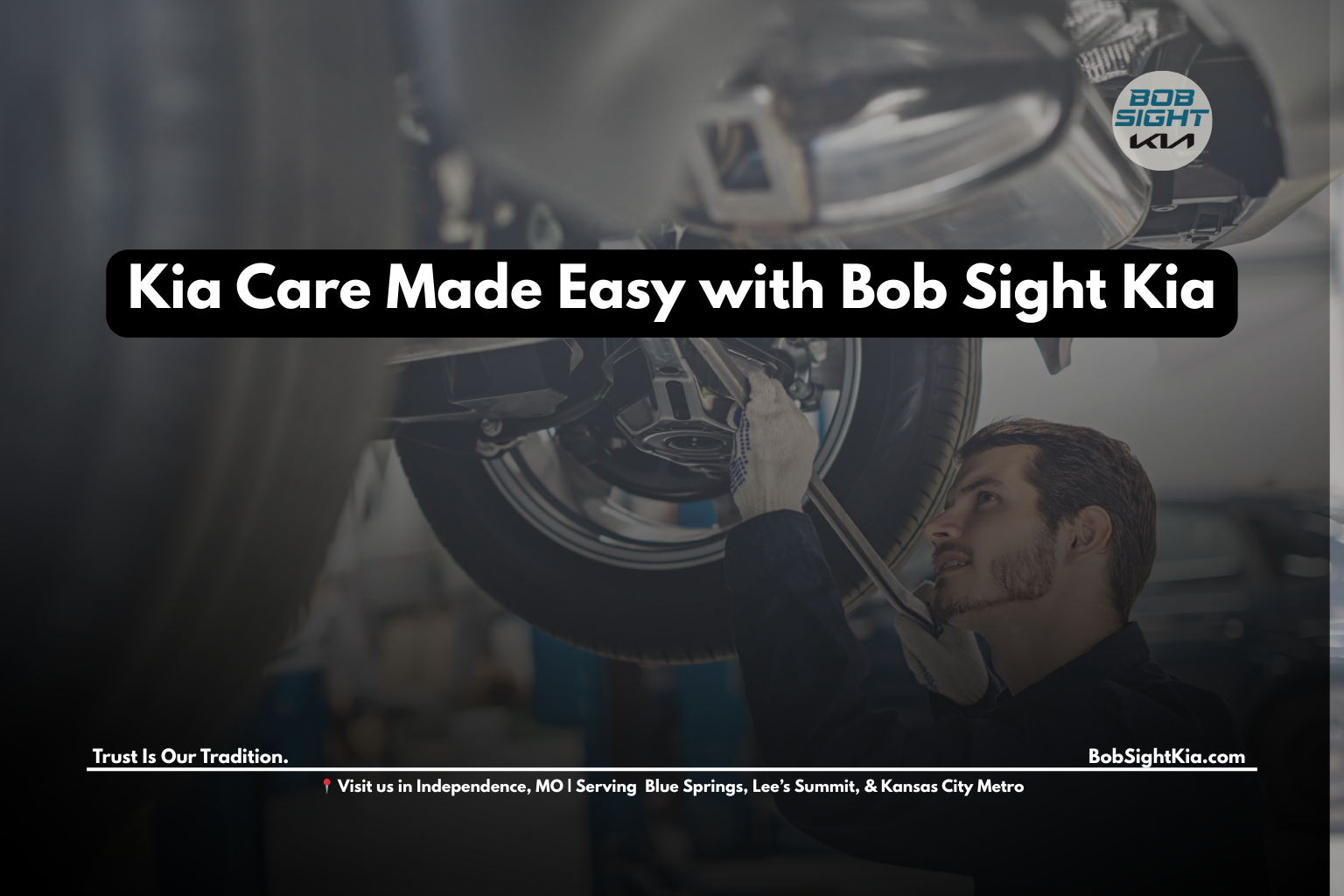 Kia technician performing maintenance on a Kia vehicle at Bob Sight Kia in Independence, MO.