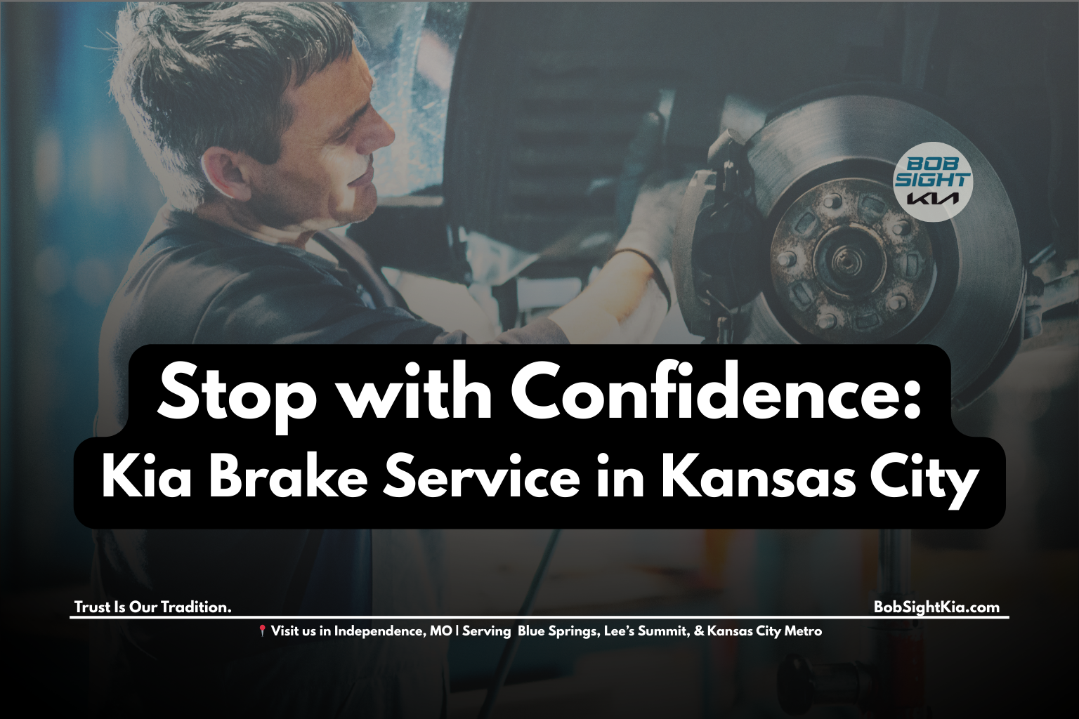 Certified technician performing Kia brake service at Bob Sight Kia in Independence MO near Kansas City