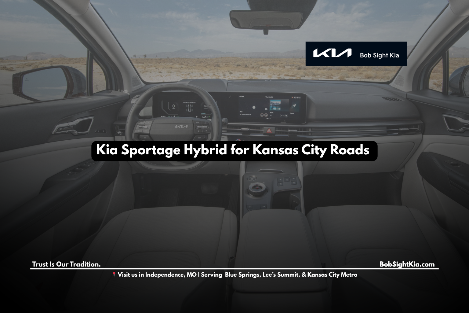 Kia Sportage Hybrid driving through Kansas City streets near Bob Sight Kia Independence