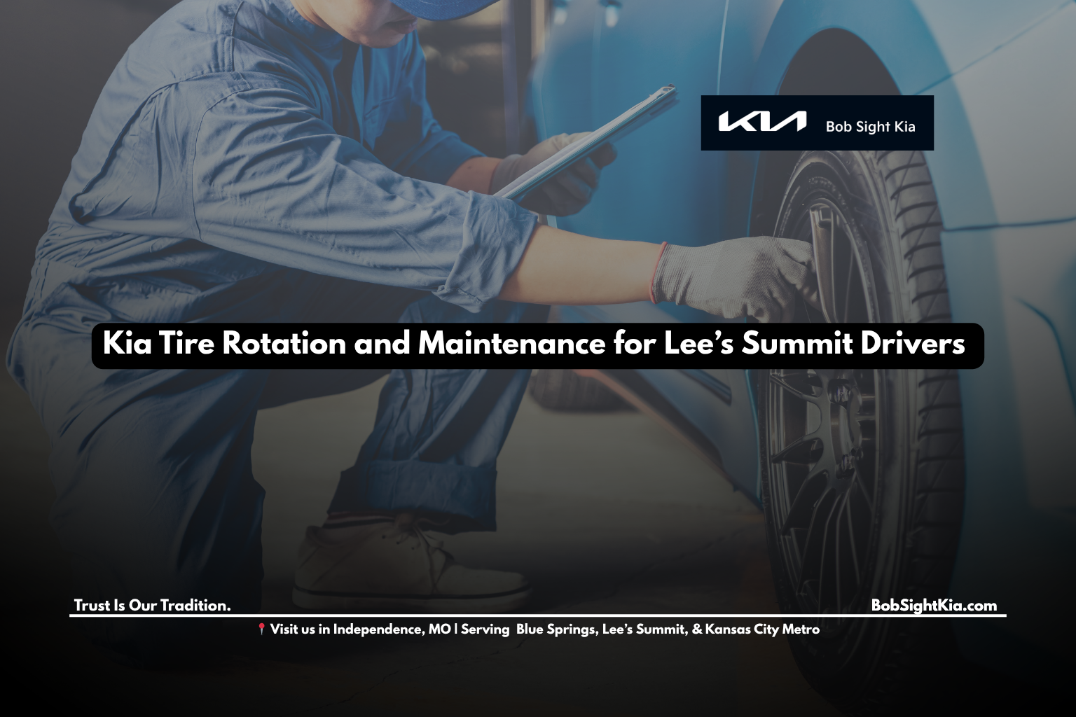 Certified technician performing Kia tire rotation near Lee’s Summit MO at Bob Sight Kia Independence