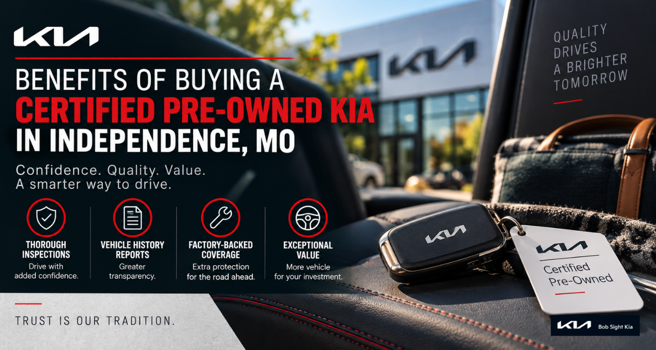 Shopper reviewing a Certified Pre-Owned Kia inspection and vehicle history at Bob Sight Kia in Independence Missouri